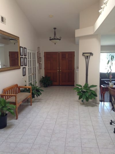 Welcoming lobby area with seating and plants