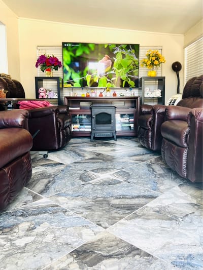 Cozy common area with comfortable seating and TV