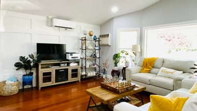 Bright living room with comfortable seating and decor