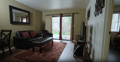 Comfortable living room with access to outdoor area