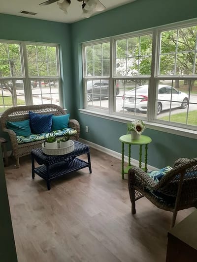 Sunlit common area with comfortable seating