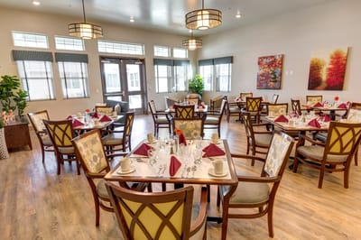 Dining area with tables set for a meal