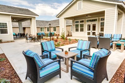 Outdoor seating area with colorful chairs