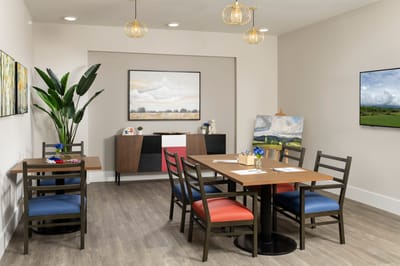 Bright common area with artwork and seating