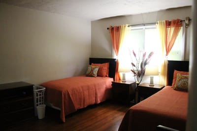 Interior view of a shared resident room with two beds