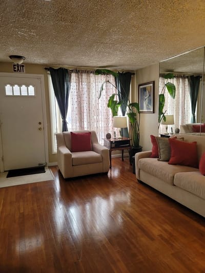 Bright common area with seating and plants