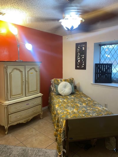 A cozy private bedroom in a senior living facility