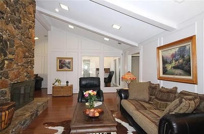 Cozy interior common area with seating and artwork