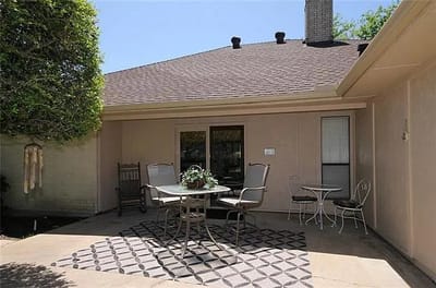 Outdoor seating area with table and chairs