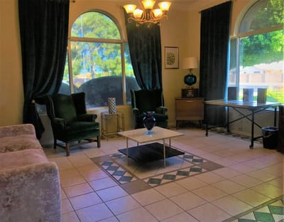 Cozy common area with seating and natural light.