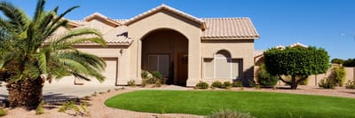 Exterior view of a residential facility with landscaping