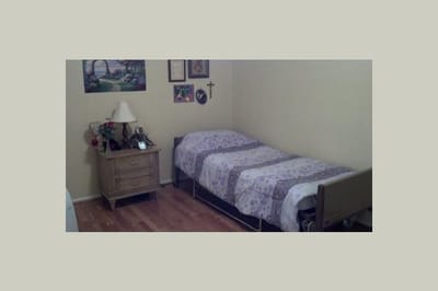 Simple private bedroom in a senior living facility