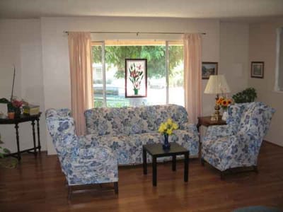Cozy living area with floral-patterned furniture