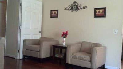 Interior lounge area with chairs and decor