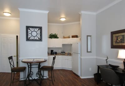 Bright kitchen area in a resident suite