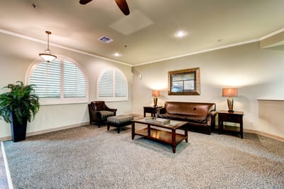 Bright, welcoming common area with seating and decorative elements