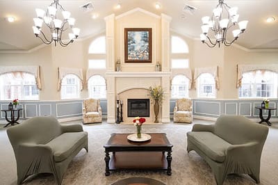 Inviting lobby area with comfortable seating and a fireplace