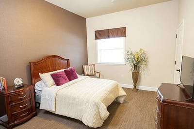 Cozy private room with a bed and décor