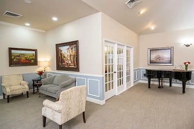 Interior common area with seating and piano