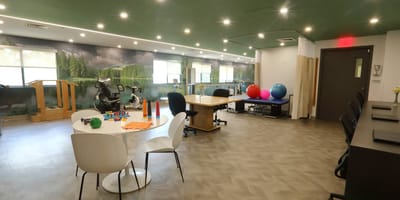 Interior activity room with therapy tools and equipment.