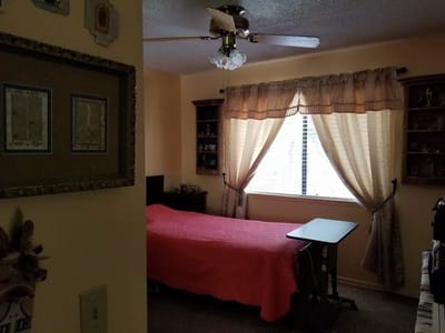 Cozy private room with a bed and window