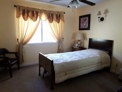 Cozy resident bedroom with a single bed and natural light