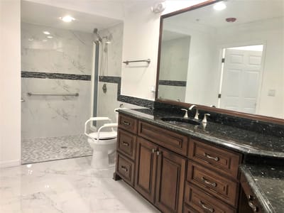 Restroom with accessible features and modern fixtures