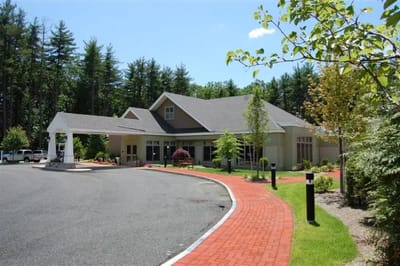 Exterior view of High Pointe House with pathway and landscaping