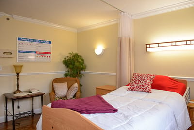 A cozy resident room with comfortable furnishings