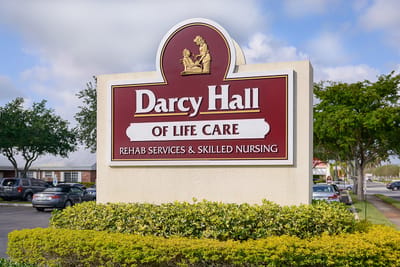Facility sign displaying the name and services offered