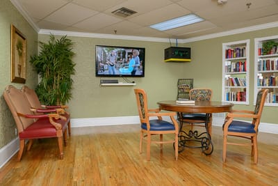 Common area with seating and a television