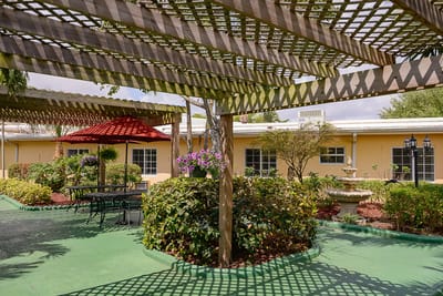 Outdoor garden area with seating and landscaping