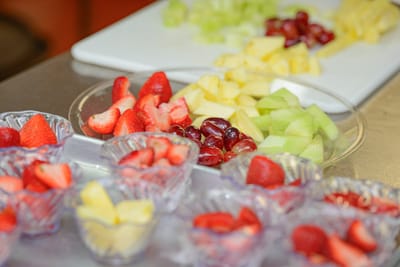 Assortment of fresh fruit in bowls