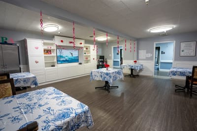 Interior view of a common area with tables and decorations