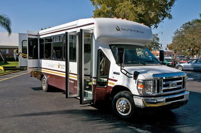 Facility transportation shuttle parked outside