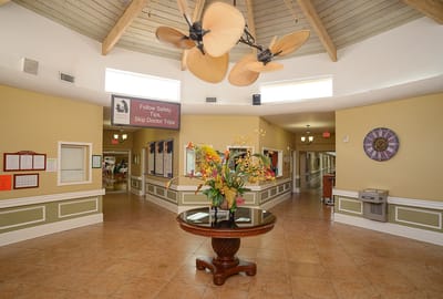 Bright common area with a decorative floral arrangement