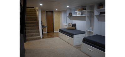 Interior view of a simple resident room with beds