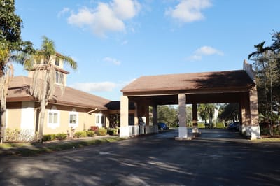 Exterior view of The Colony Club Sunrise entrance