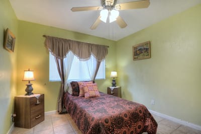 Cozy private room with decorative bedding