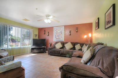 Cozy common area with couches and TV