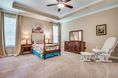 A well-decorated private resident room with a floral theme