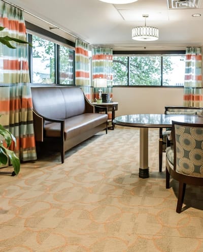 Bright common area with seating and decor
