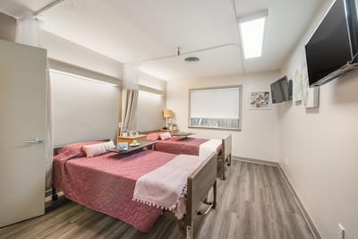 Cozy shared bedroom in a senior care facility