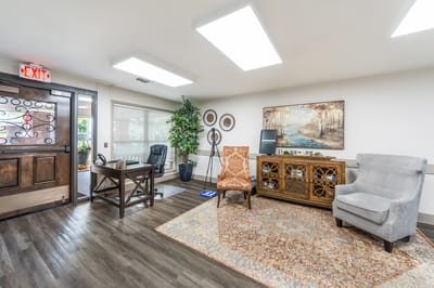 Bright common area with seating and decor