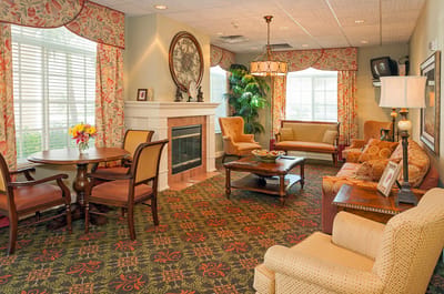 Cozy common area with seating and fireplace