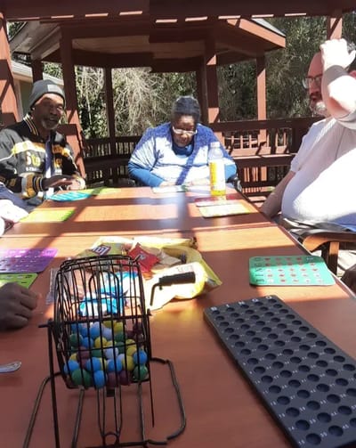 Residents enjoying a game outdoors