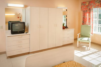 Private resident room with furniture and natural light