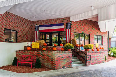 Entrance of the facility decorated for autumn