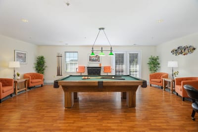 Interior view of a common area with a pool table