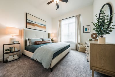 Brightly decorated resident bedroom in a senior living facility